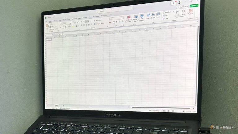 a-laptop-with-a-blank-microsoft-excel-workbook-displayed-on-screen