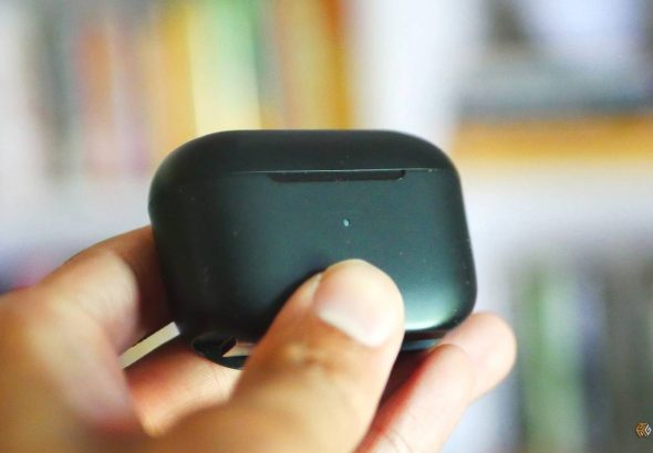 hand-holding-a-jlab-go-pop-earbuds-case