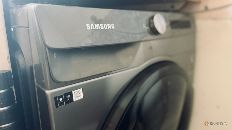 a-samsung-washing-machine-with-a-wi-fi-label-on-the-front-of-it