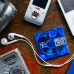 a-selection-of-nostalgic-retro-late-2000s-gadgets-including-an-ipod-minidisc-player-digital-slr-and-nintendo-ds