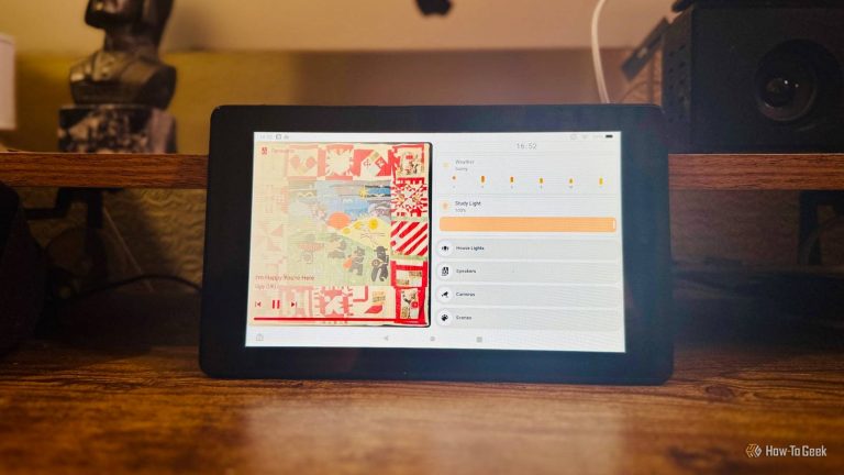a-tablet-leaning-on-a-shelf-between-a-figurine-and-a-smart-speaker-showing-a-home-assistant-dashboard