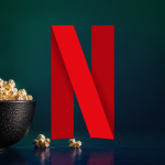 netflix-n-logo-beside-a-bowl-of-popcorn-on-a-dark-background