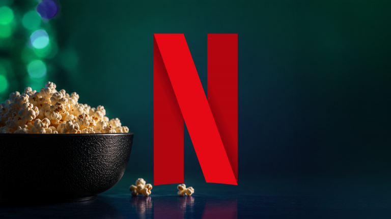 netflix-n-logo-beside-a-bowl-of-popcorn-on-a-dark-background