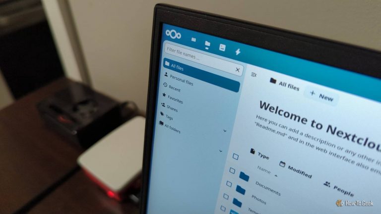 nextcloud-interface-on-a-laptop-screen-with-two-raspberry-pi-devices-in-the-background