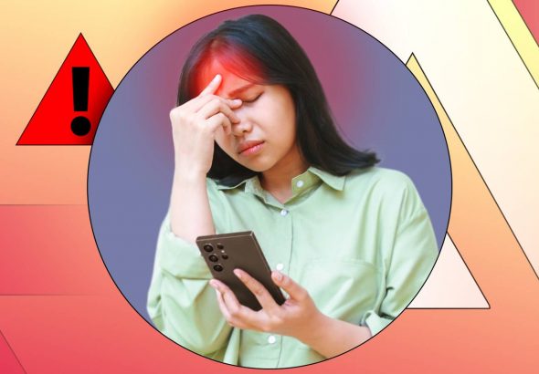 woman-holding-a-phone-with-a-headache